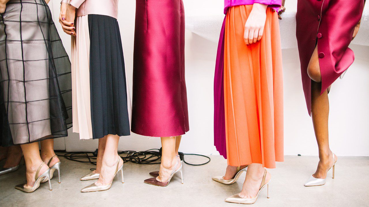 Women lined up in skirts