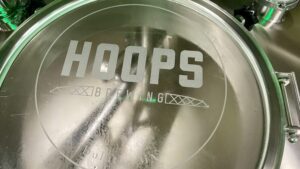 The Hoops logo on the window of its mash tun