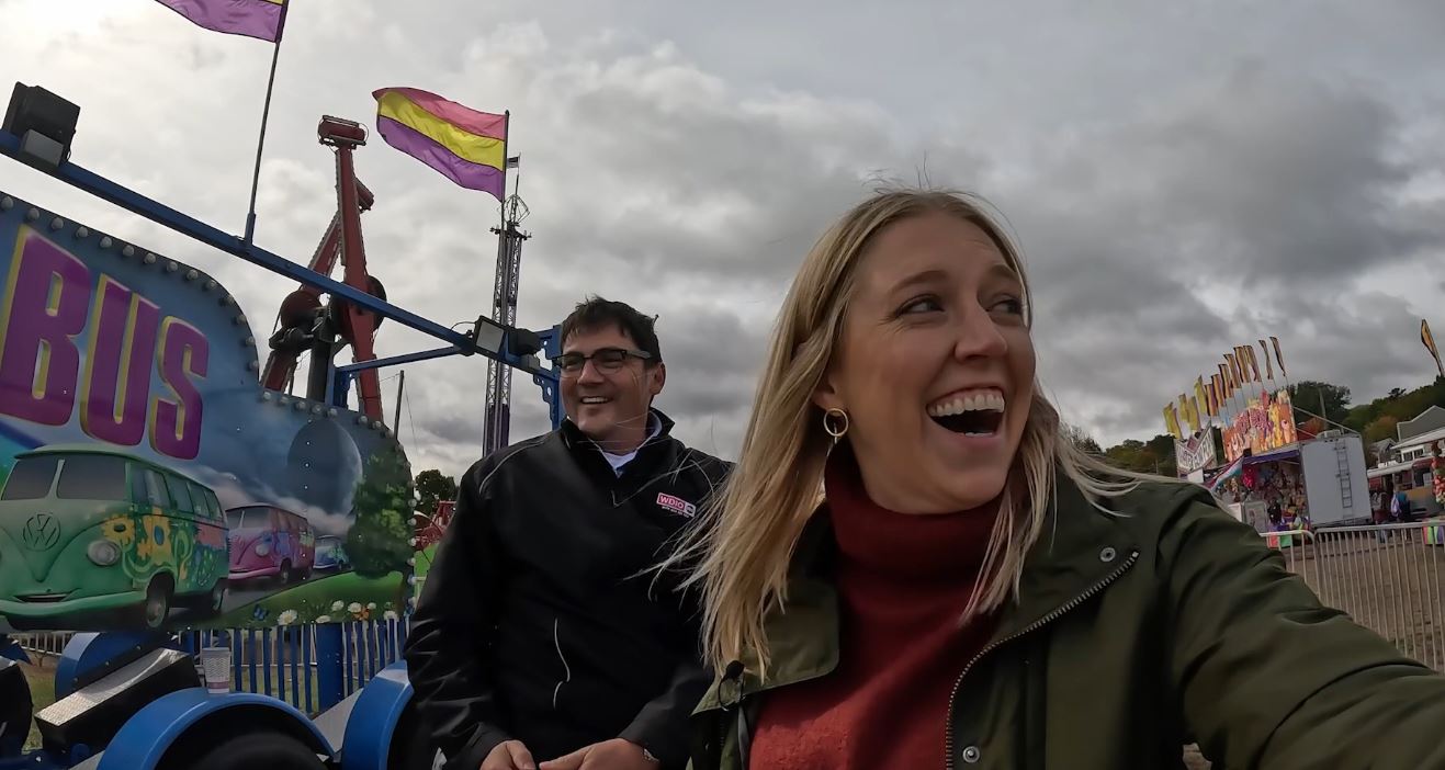 Justin Liles and Baihly Warfield on a kiddie ride