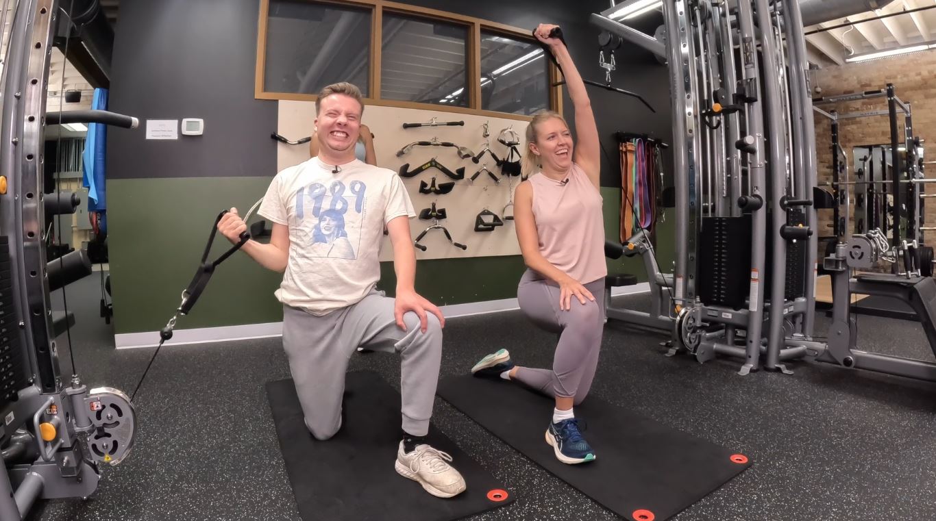 Kenny Johnson and Baihly Warfield lifting weights