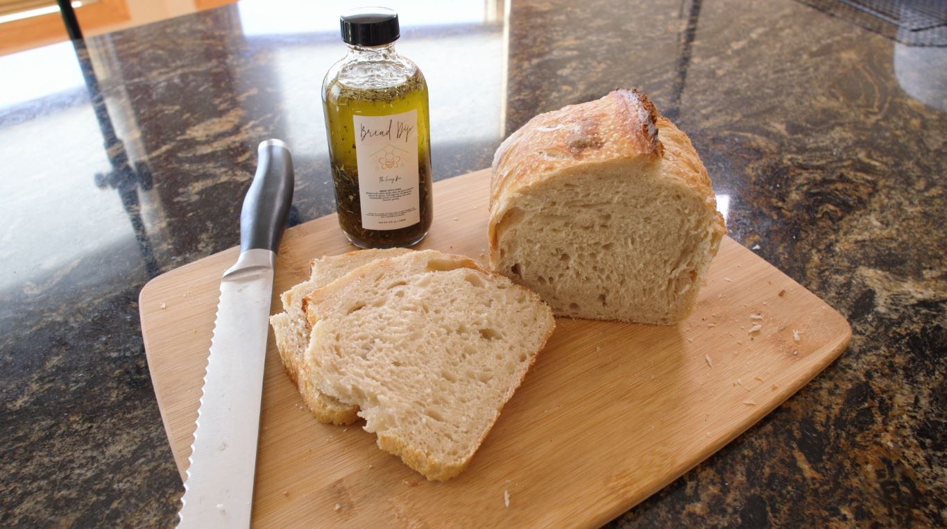 A sourdough loaf and bread dip