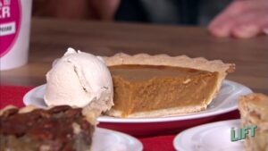 Pumpkin pie with a scoop of cinnamon ice cream