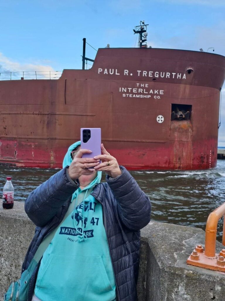 Lauren Olson taking a selfie with the Tregurtha