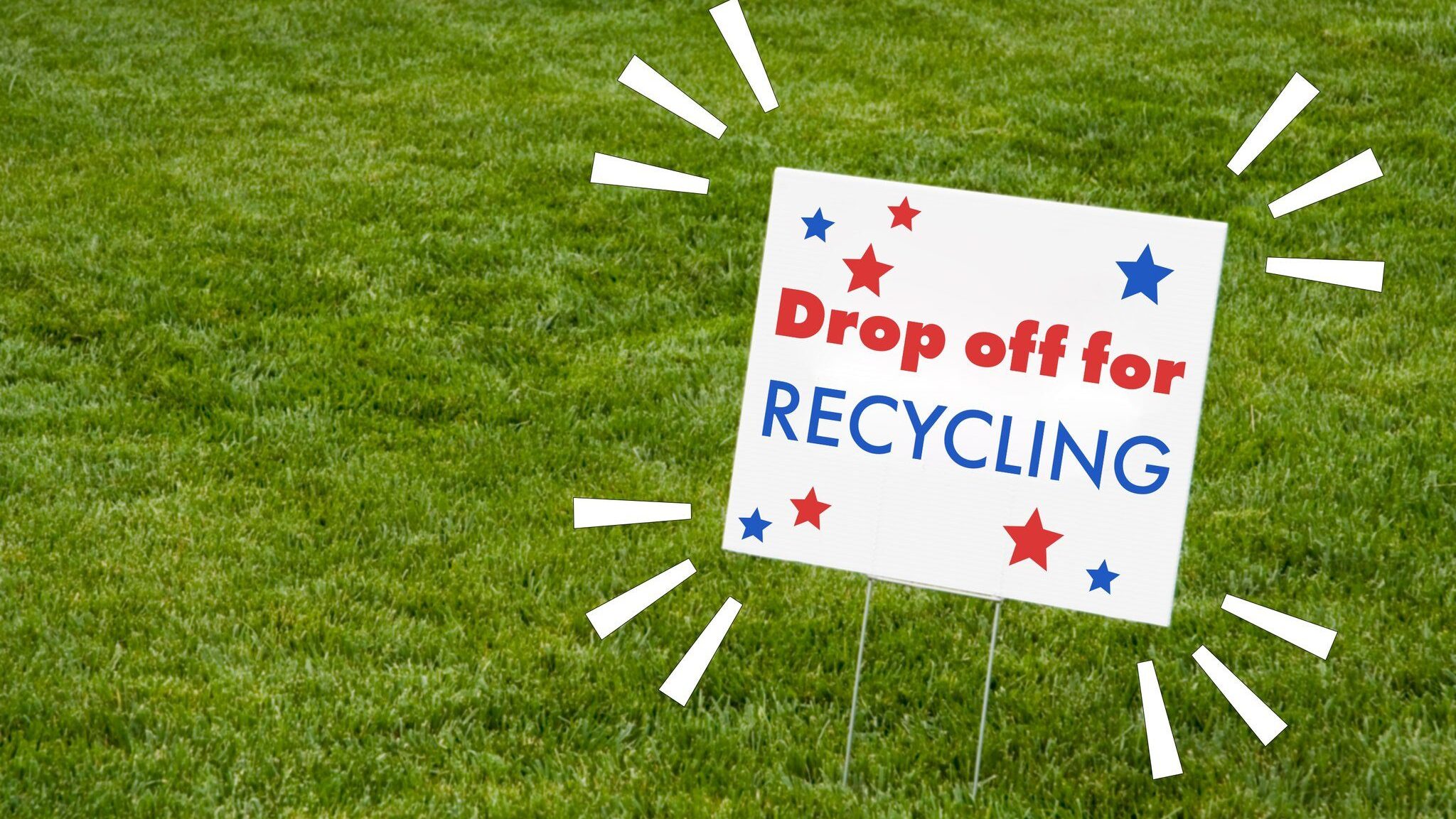 A yard sign that says "Drop off for recycling"