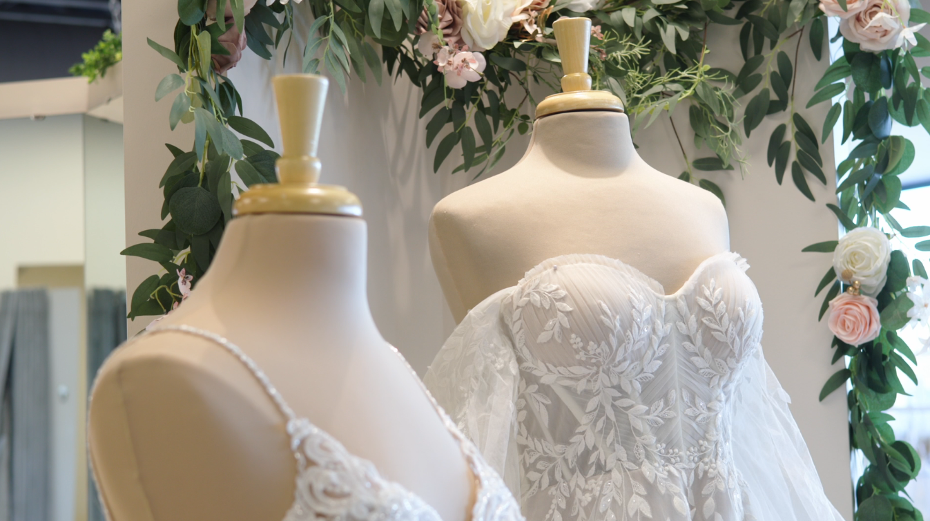 Dresses on mannequins at Bella Rose Bridal