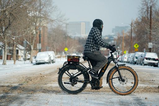 A frigid storm drops rare snow on Houston and New Orleans as Florida ...